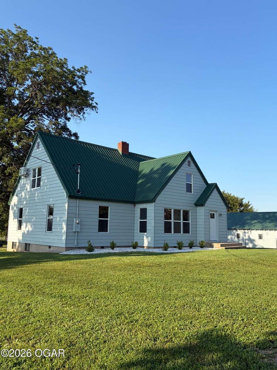 4.9 Acres of Land with Home for Sale in Sarcoxie, Missouri