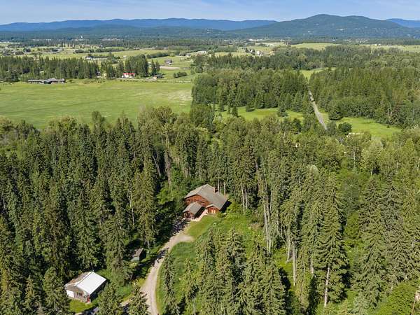 5 Acres of Land with Home for Sale in Whitefish, Montana
