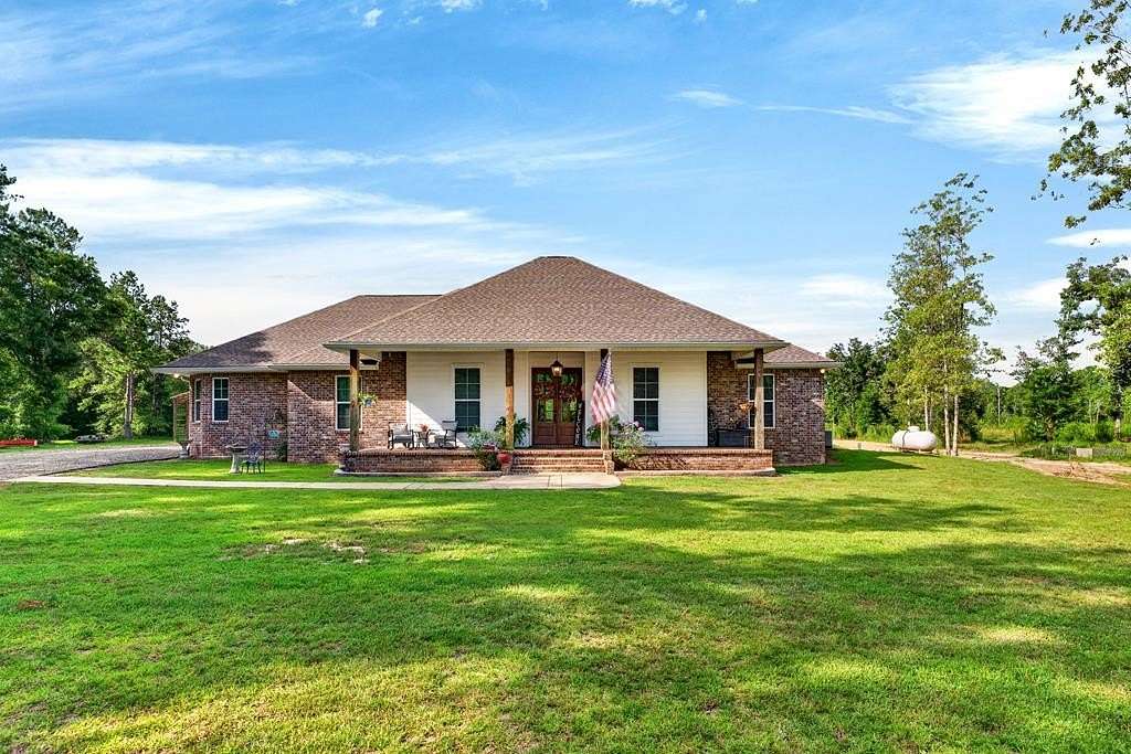 41.4 Acres of Land with Home for Sale in Carriere, Mississippi