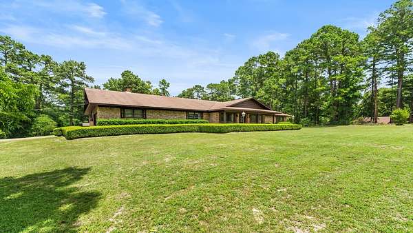 3 Acres of Land with Home for Sale in Atlanta, Texas