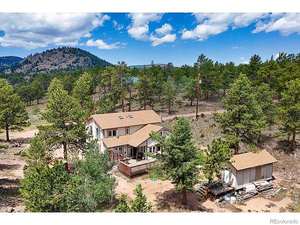 2.6 Acres of Land with Home for Sale in Red Feather Lakes, Colorado
