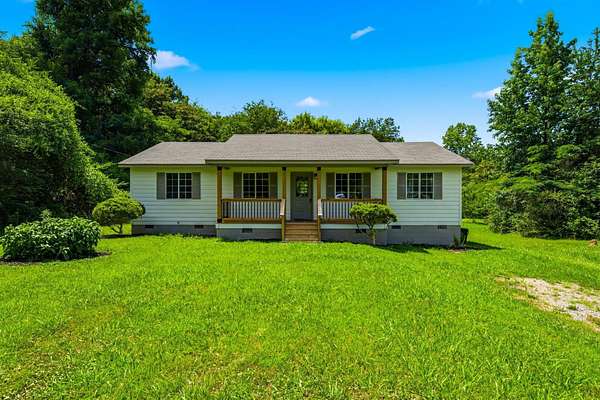 1.5 Acres of Land with Home for Sale in Etowah, Tennessee