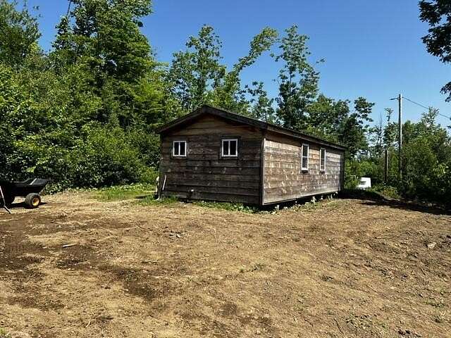 12.8 Acres of Land with Home for Sale in Oakfield, Maine