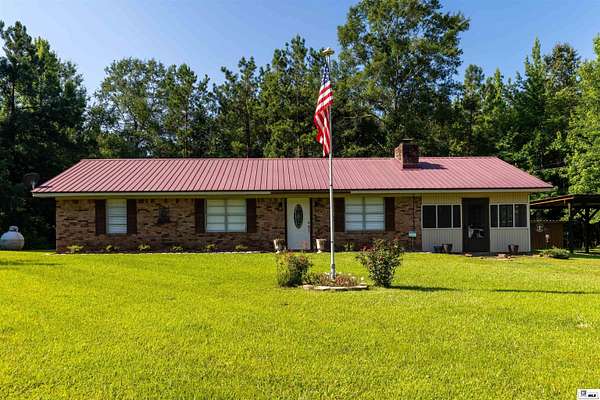 6.4 Acres of Land with Home for Lease in Eros, Louisiana