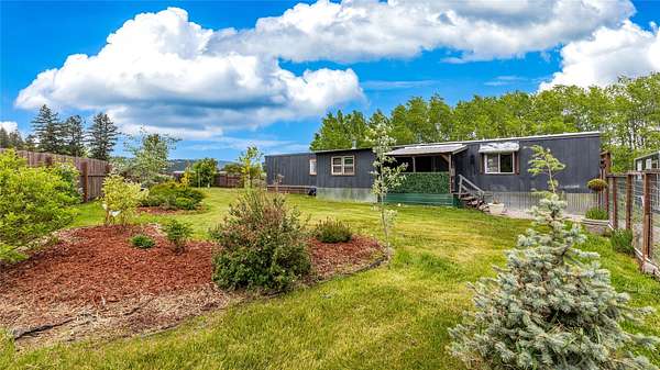 12.1 Acres of Land with Home for Sale in Kalispell, Montana