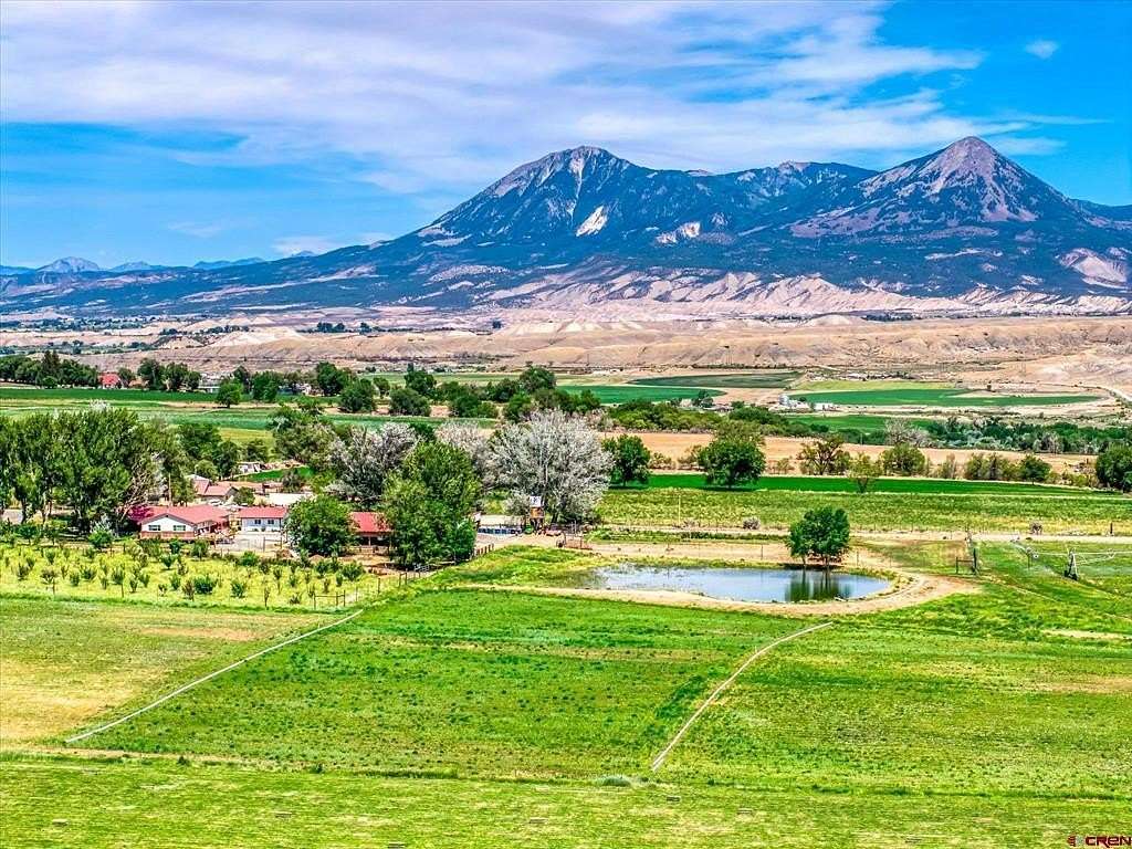 45 Acres of Agricultural Land with Home for Sale in Hotchkiss, Colorado