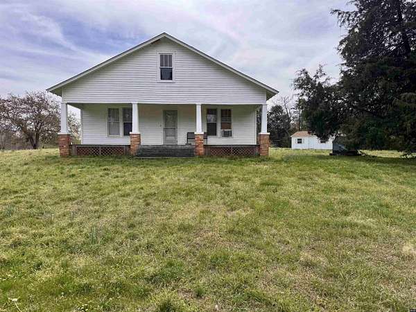 28.5 Acres of Land with Home for Sale in Paris, Tennessee
