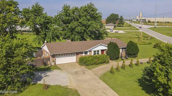4.32 Acres of Land with Home for Sale in Joplin, Missouri