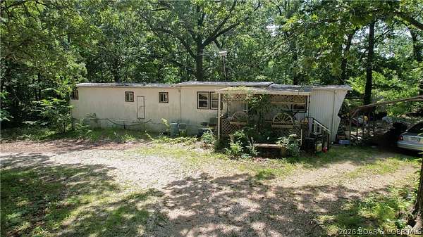 5.3 Acres of Land with Home for Sale in Camdenton, Missouri