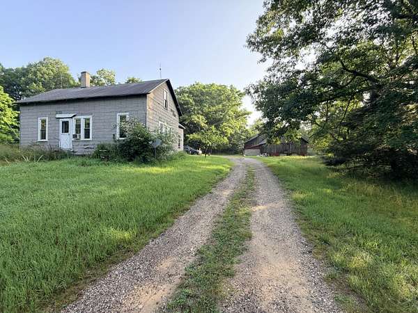 20.2 Acres of Recreational Land with Home for Sale in Manistee, Michigan