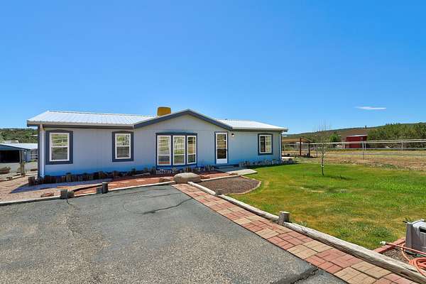 2.36 Acres of Land with Home for Sale in Sandia Park, New Mexico