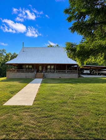 10.5 Acres of Land with Home for Sale in Grove Hill, Alabama
