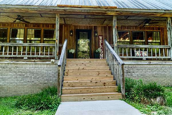 10.5 Acres of Land with Home for Sale in Grove Hill, Alabama