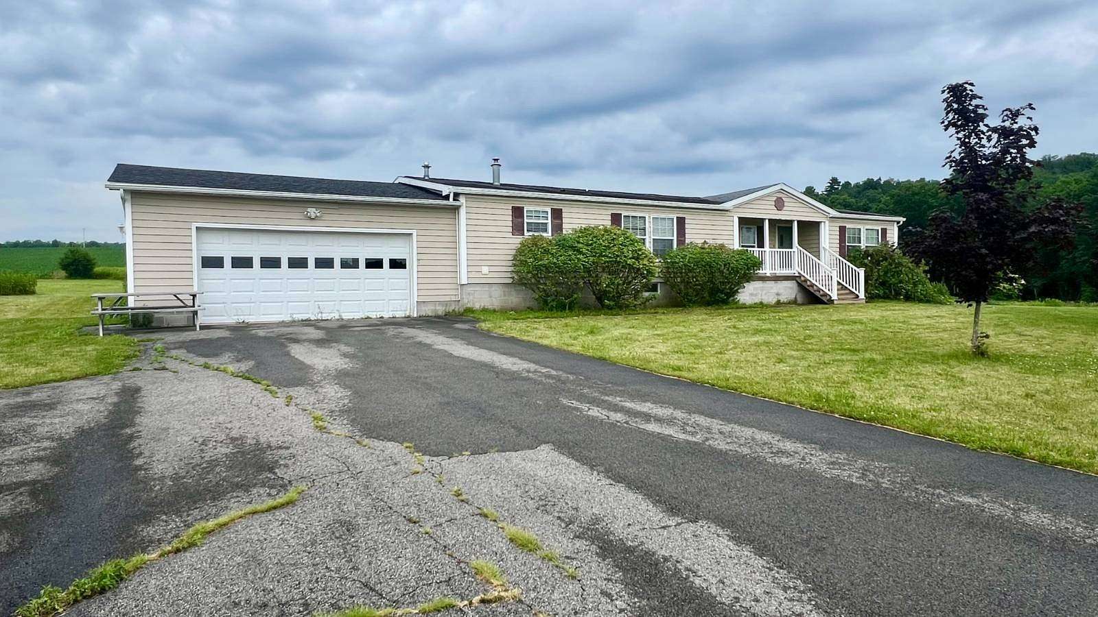 2.1 Acres of Land with Home for Sale in Amsterdam, New York