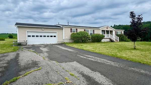 2.1 Acres of Land with Home for Sale in Amsterdam, New York