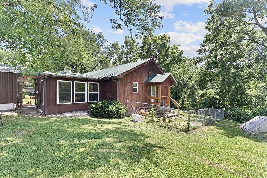 2.16 Acres of Land with Home for Sale in Rocky Comfort, Missouri