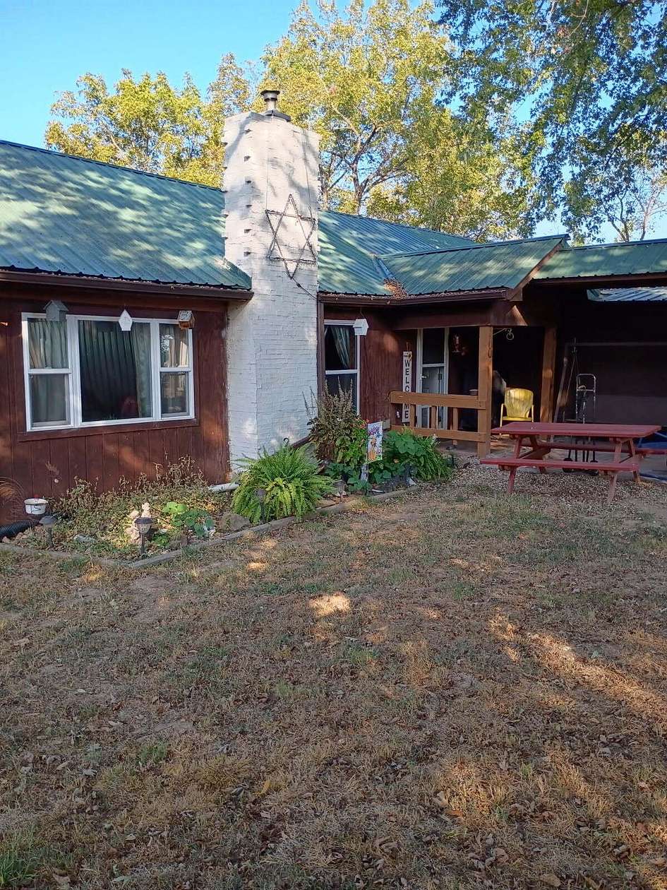 2.16 Acres of Land with Home for Sale in Rocky Comfort, Missouri