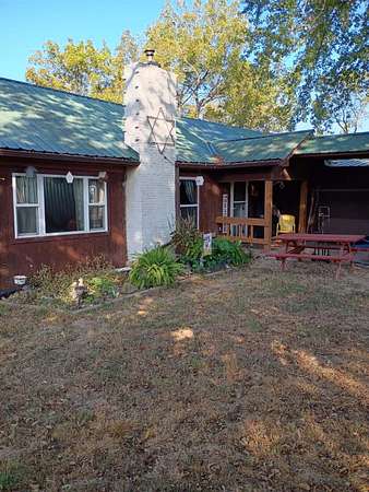 2.16 Acres of Land with Home for Sale in Rocky Comfort, Missouri