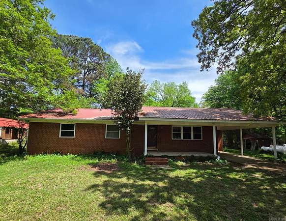 10.7 Acres of Land with Home for Sale in Malvern, Arkansas