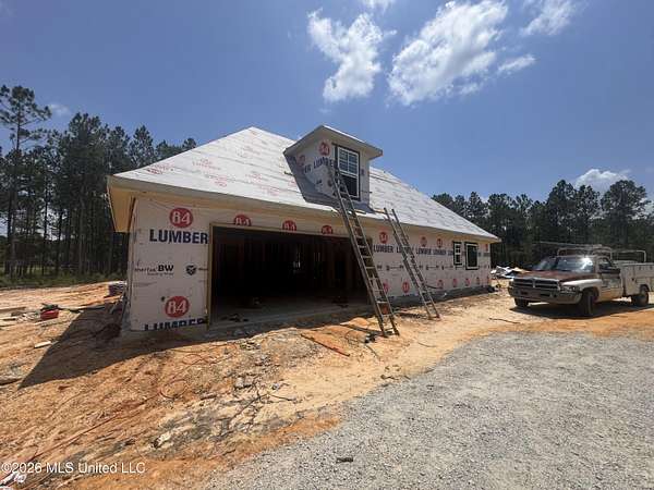 1.75 Acres of Land with Home for Sale in Kiln, Mississippi