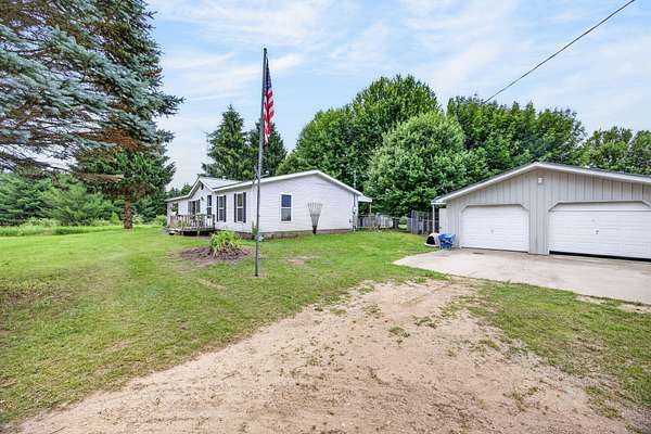 6.9 Acres of Land with Home for Sale in Harrison, Michigan
