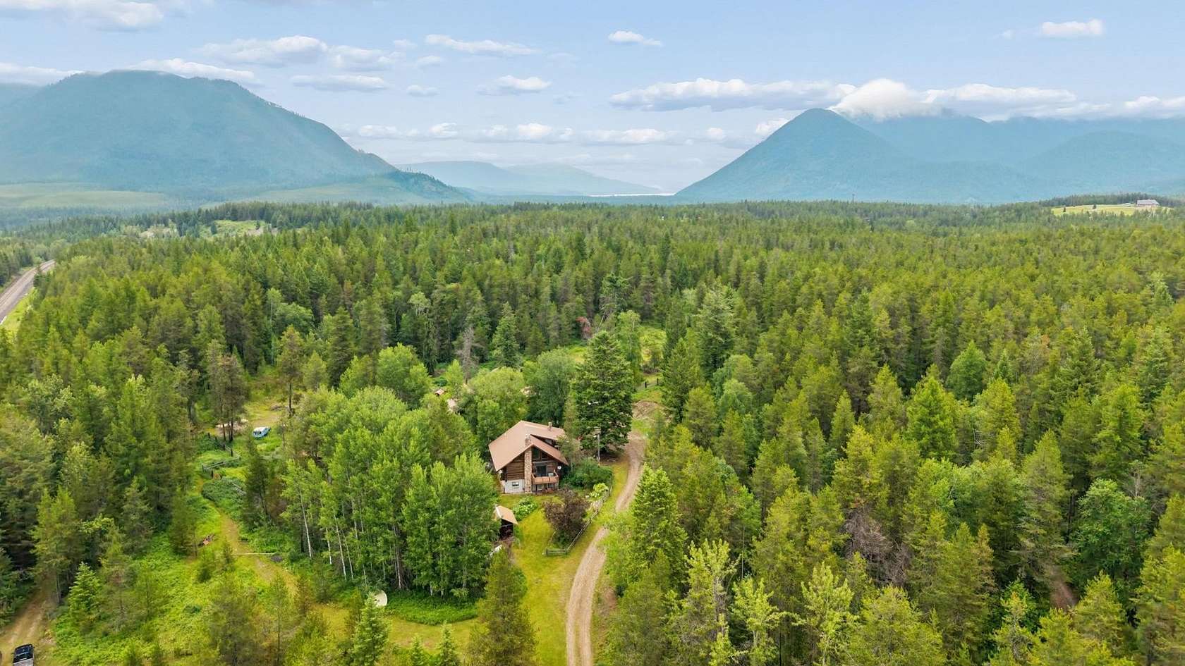 9.36 Acres of Land with Home for Sale in West Glacier, Montana
