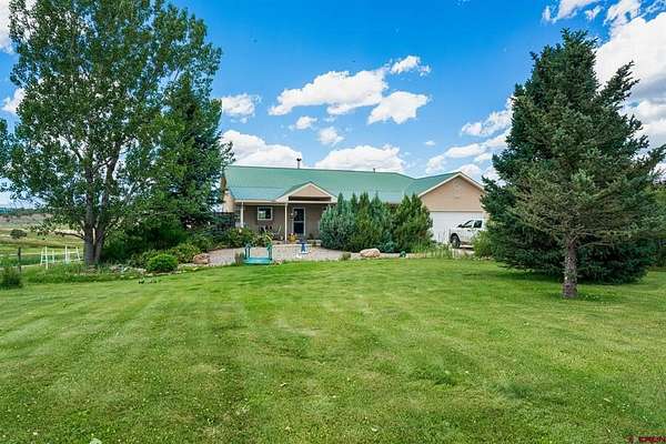 6.43 Acres of Land with Home for Sale in Ignacio, Colorado