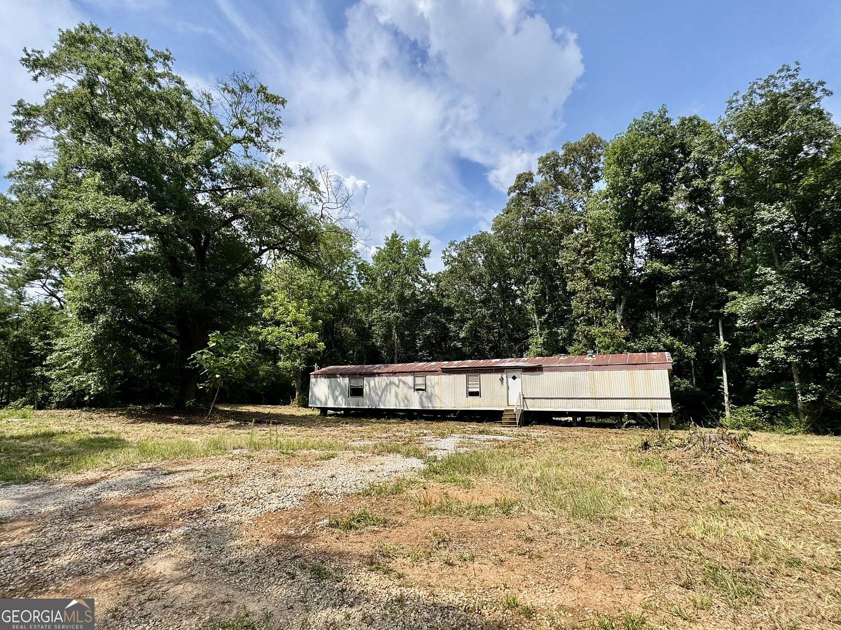 5 Acres of Land with Home for Sale in Bowdon, Georgia