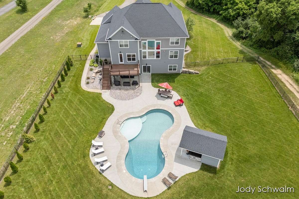 3 Acres of Land with Home for Sale in Rockford, Michigan