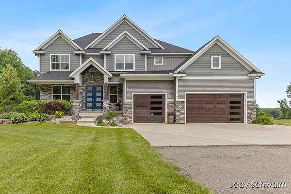 3 Acres of Land with Home for Sale in Rockford, Michigan