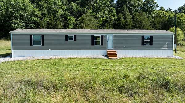 7 Acres of Land with Home for Sale in Bethelridge, Kentucky