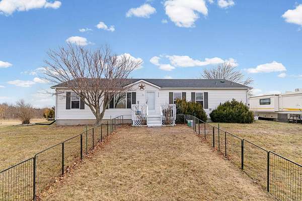 6.7 Acres of Land with Home for Sale in Osborn, Missouri