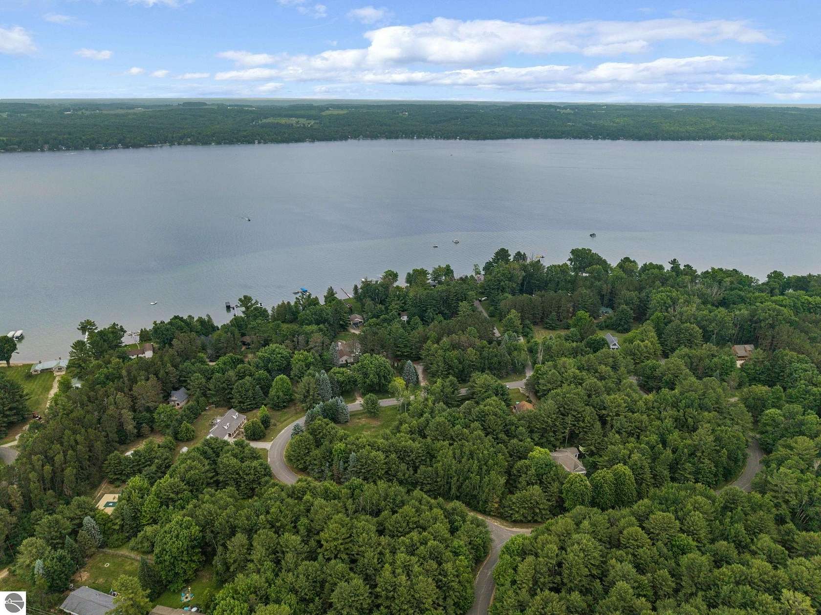 0.36 Acres of Residential Land for Sale in Kewadin, Michigan