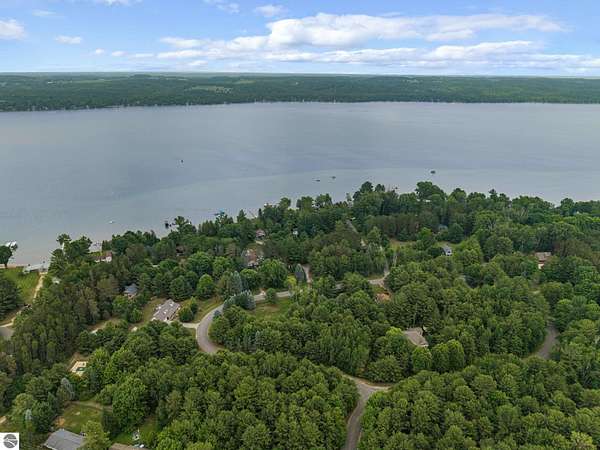 0.36 Acres of Residential Land for Sale in Kewadin, Michigan
