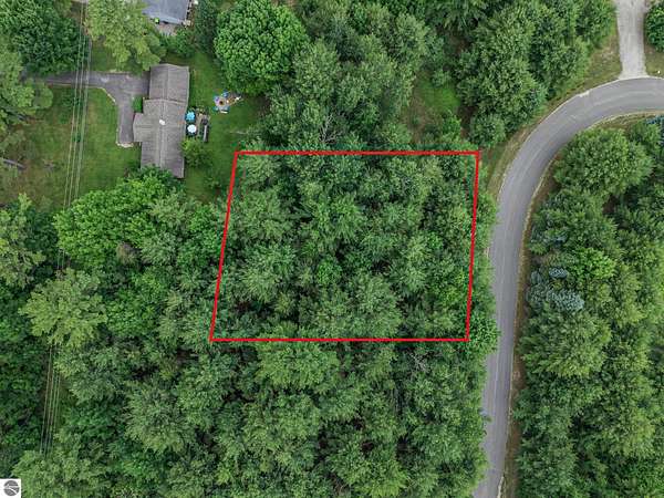 0.39 Acres of Residential Land for Sale in Kewadin, Michigan