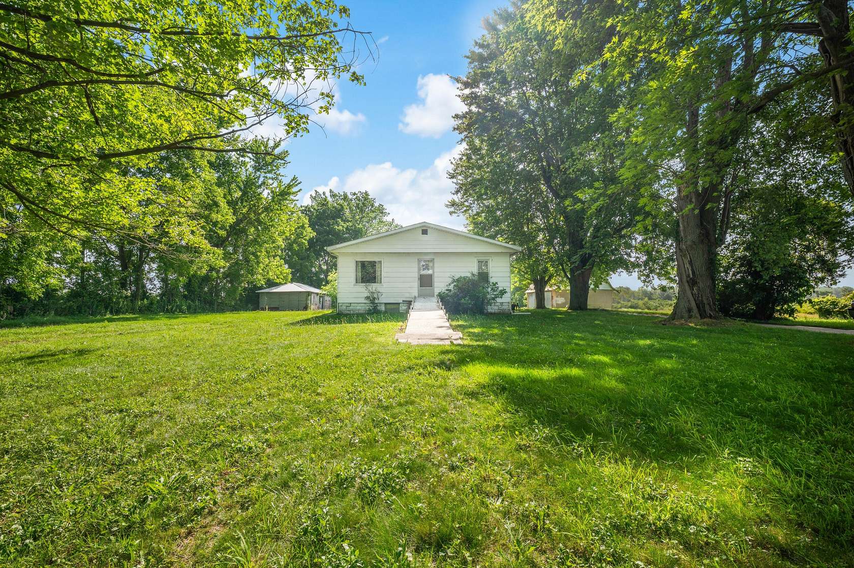 40 Acres of Agricultural Land with Home for Sale in Eau Claire, Michigan