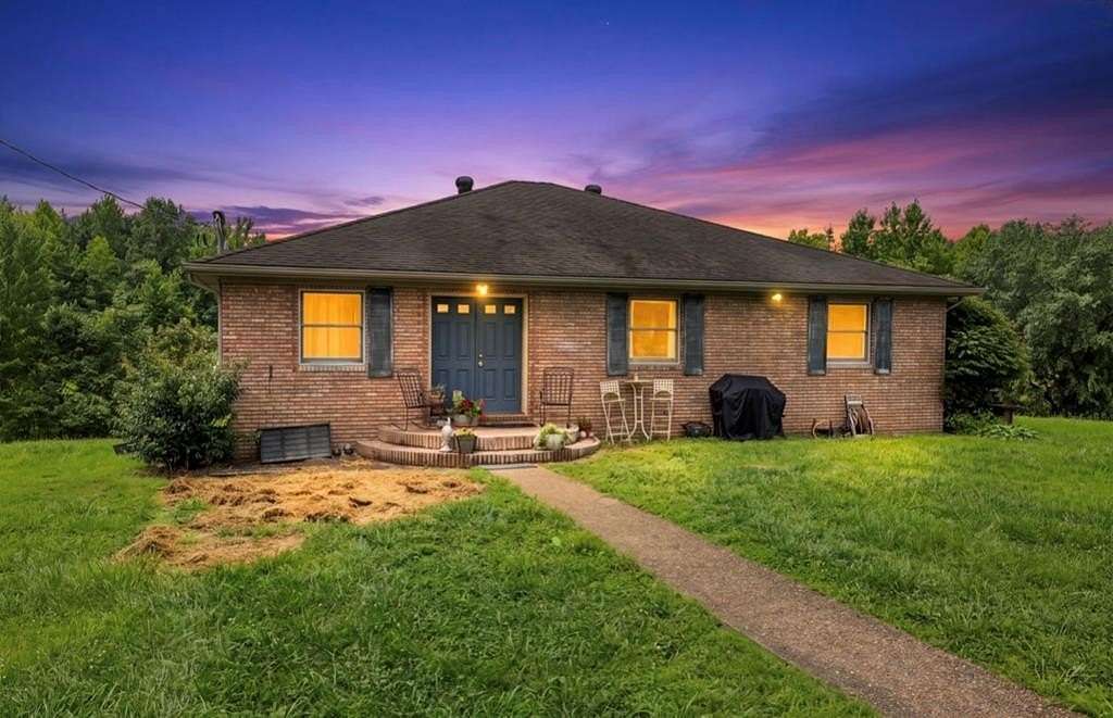 10 Acres of Land with Home for Sale in Slaughters, Kentucky