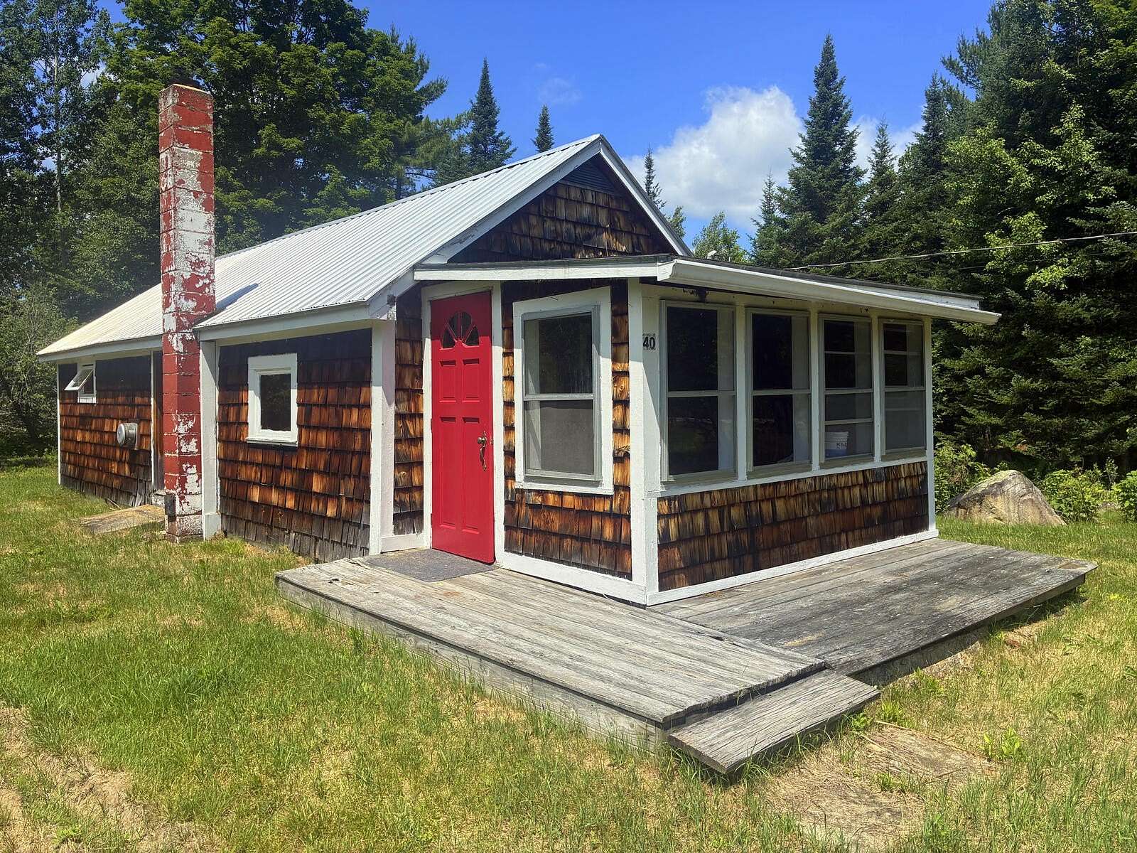 0.66 Acres of Land with Home for Sale in Carthage, Maine