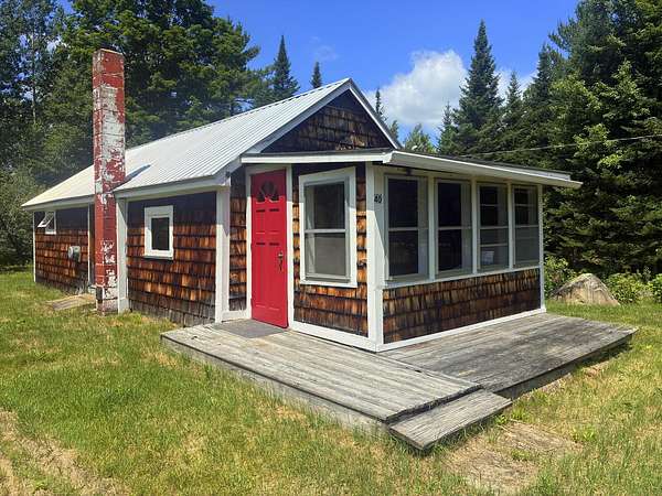 0.66 Acres of Land with Home for Sale in Carthage, Maine