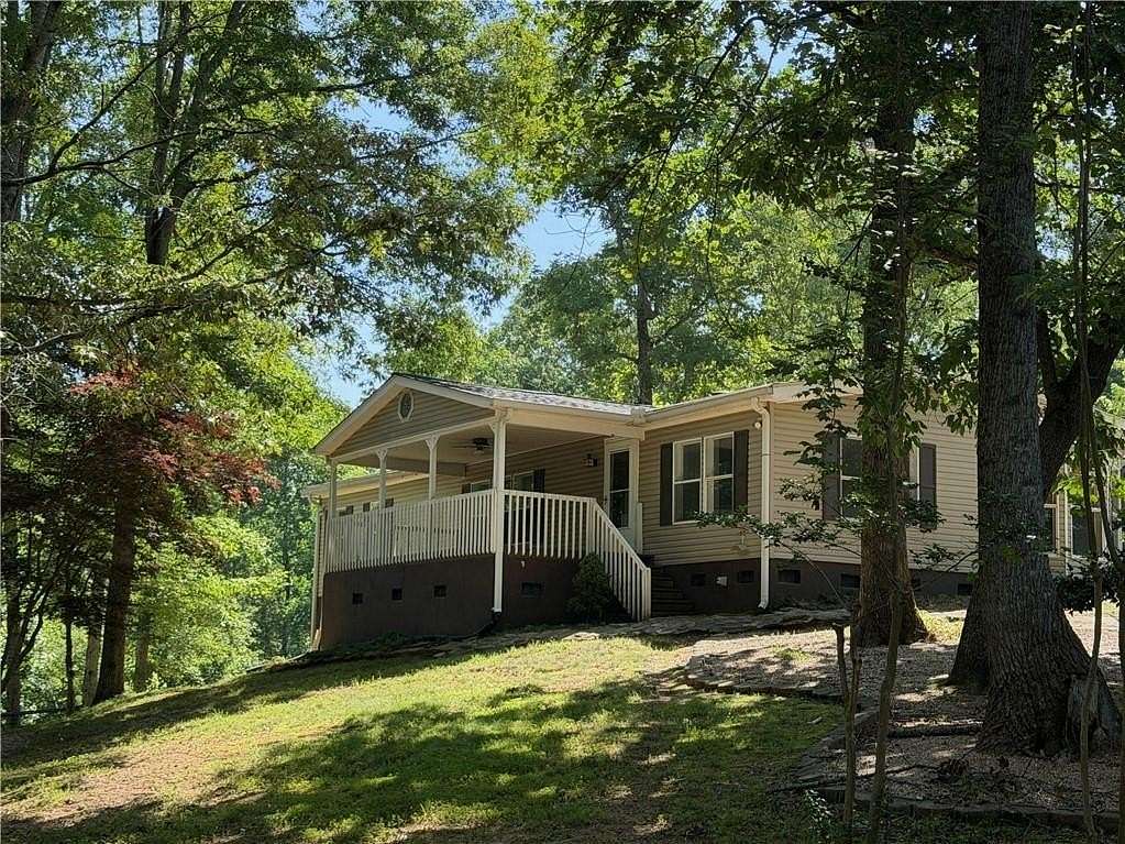 11 Acres of Recreational Land with Home for Sale in Lula, Georgia