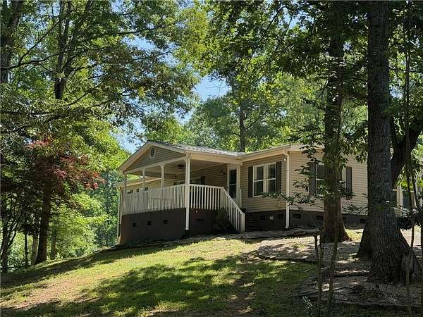 11 Acres of Recreational Land with Home for Sale in Lula, Georgia