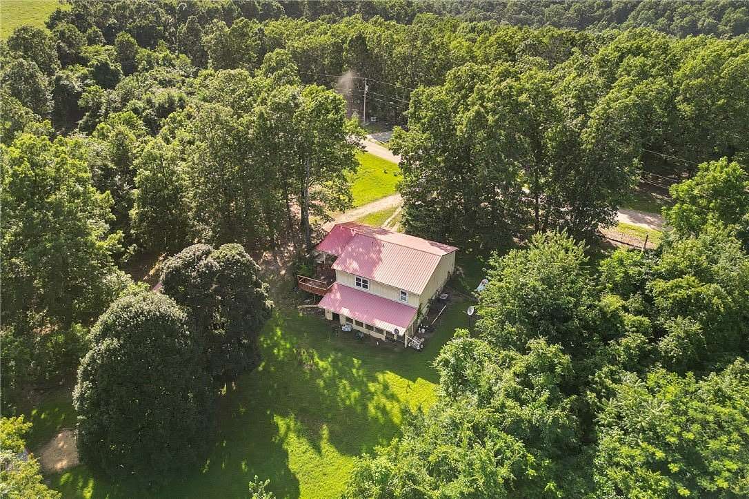 8.82 Acres of Land with Home for Sale in Harrison, Arkansas
