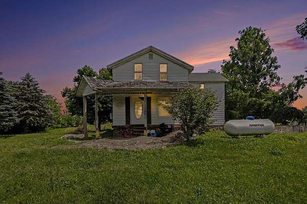 3.5 Acres of Land with Home for Sale in Eau Claire, Michigan