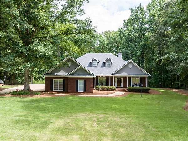 5 Acres of Land with Home for Sale in Smiths Station, Alabama