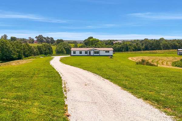 10 Acres of Land with Home for Sale in Clever, Missouri