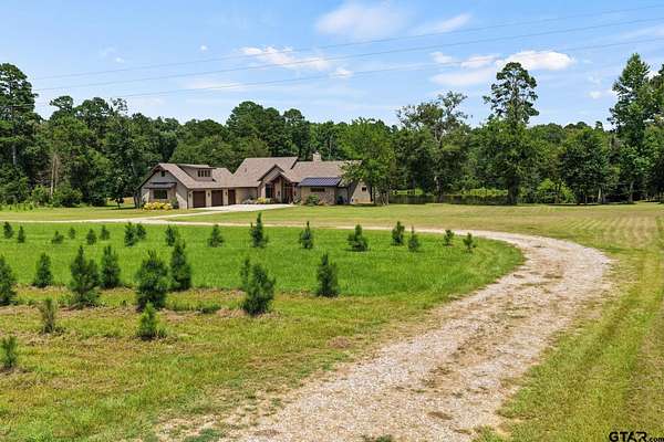 49.6 Acres of Land with Home for Sale in Pittsburg, Texas
