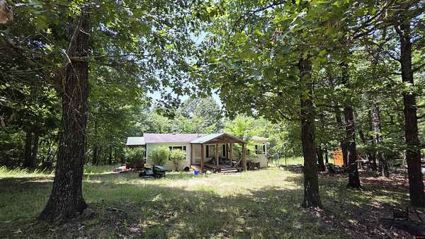 5 Acres of Land with Home for Sale in Yellville, Arkansas