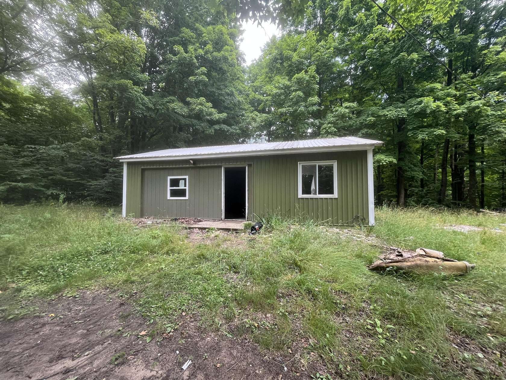 3 Acres of Land with Home for Sale in Mesick, Michigan