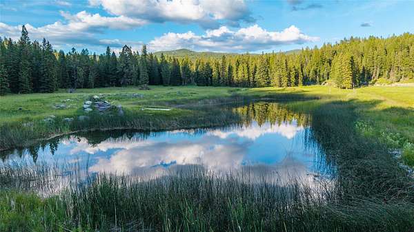21 Acres of Recreational Land with Home for Sale in Kila, Montana