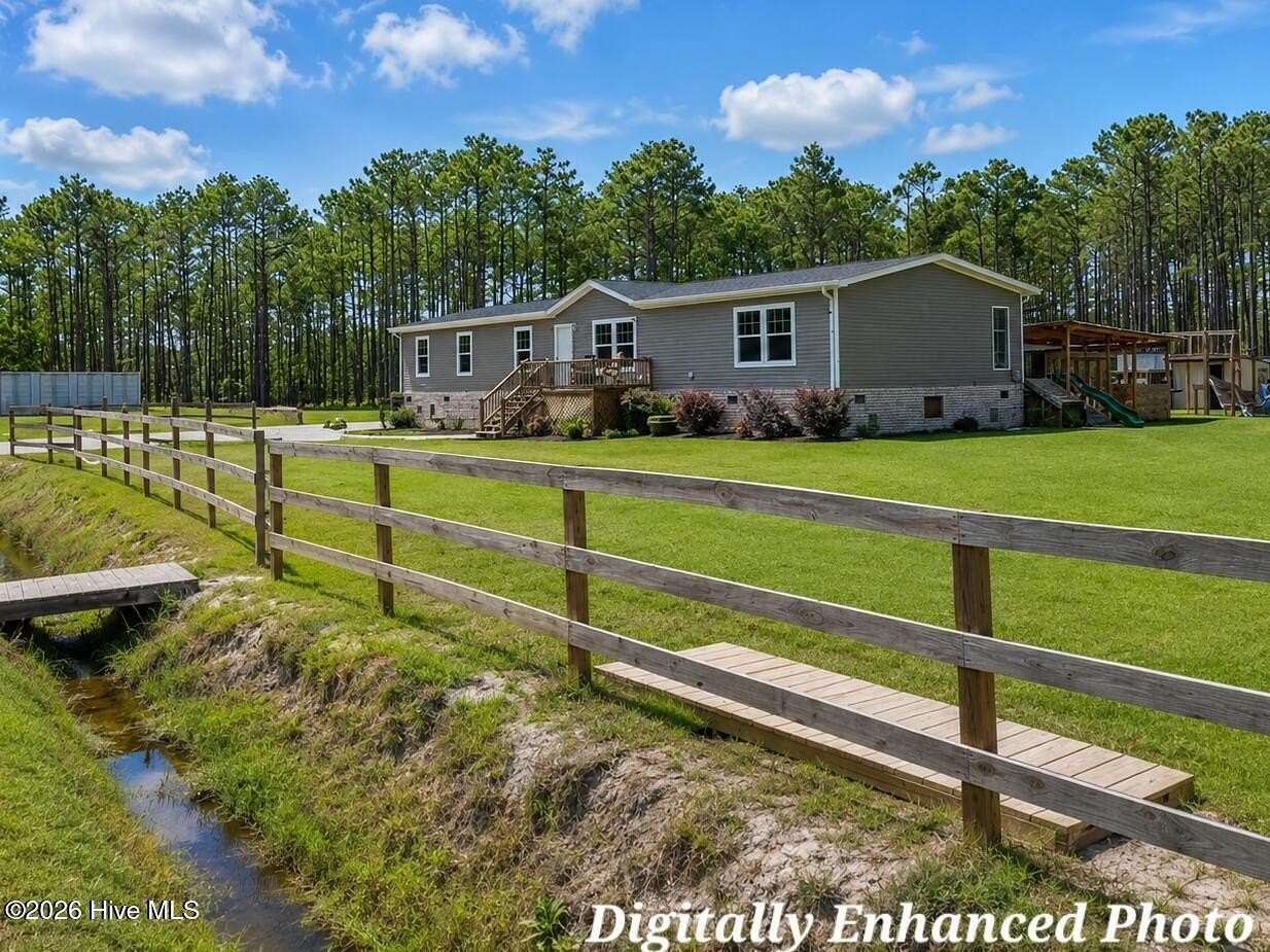 6.22 Acres of Land with Home for Sale in Hampstead, North Carolina